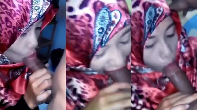 Tante Hijab Merah Sepong Kontol